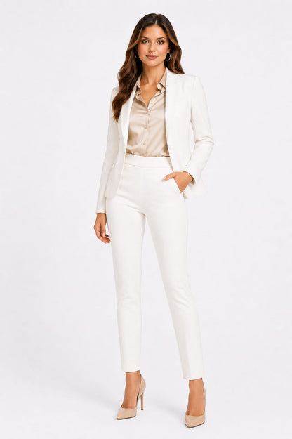 Blazer Essence – Largo medio con botón central y bolsillos de tapa
